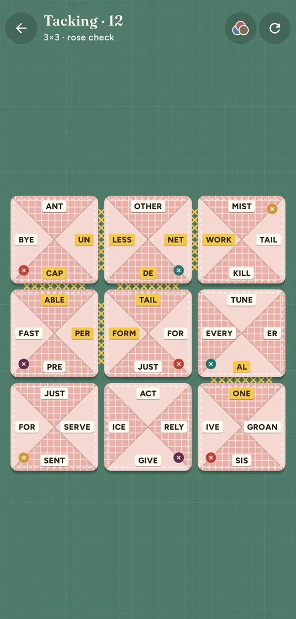 A board mid-game with some seams stitched gold and others still to join